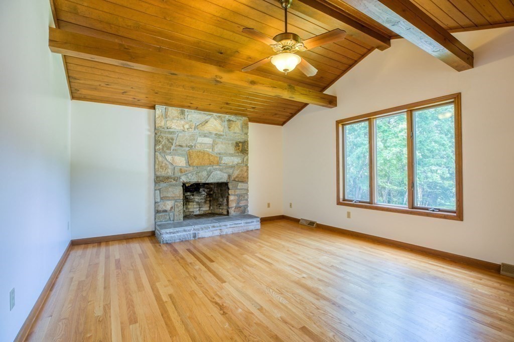 65 White Loaf Road Southampton, MA 01073 - Photo 6 of 33 a view of an empty room with a window and wooden floor