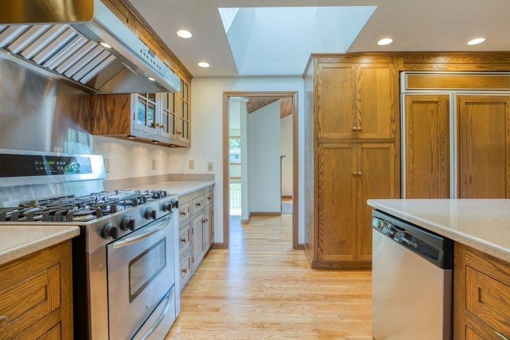 65 White Loaf Road Southampton, MA 01073 - Photo 7 of 33 a kitchen with stainless steel appliances granite countertop a stove and a refrigerator