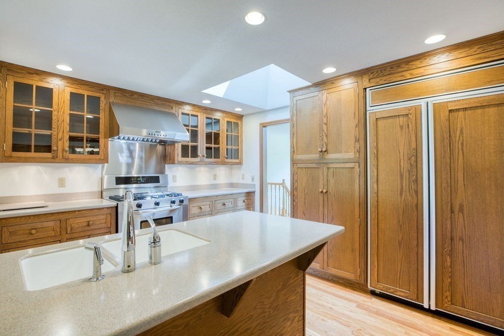 65 White Loaf Road Southampton, MA 01073 - Photo 8 of 33 a kitchen with stainless steel appliances granite countertop a sink a stove and a refrigerator