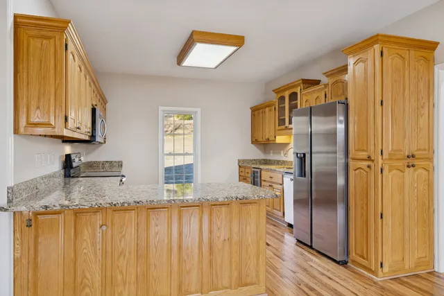 a backyard of a house with lots of green space