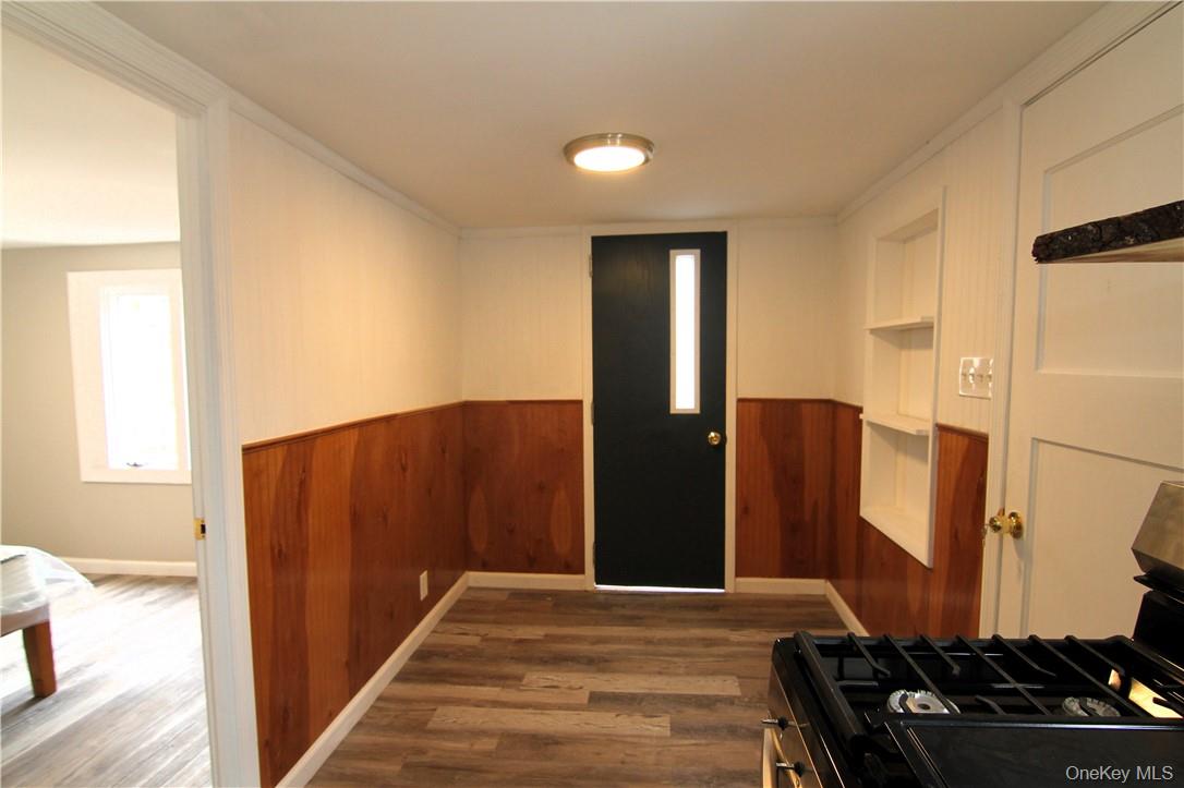 71 Miller Road, Unit 5 Hopewell Junction, NY 12533 - Photo 4 of 20 a view of a refrigerator and window in a kitchen