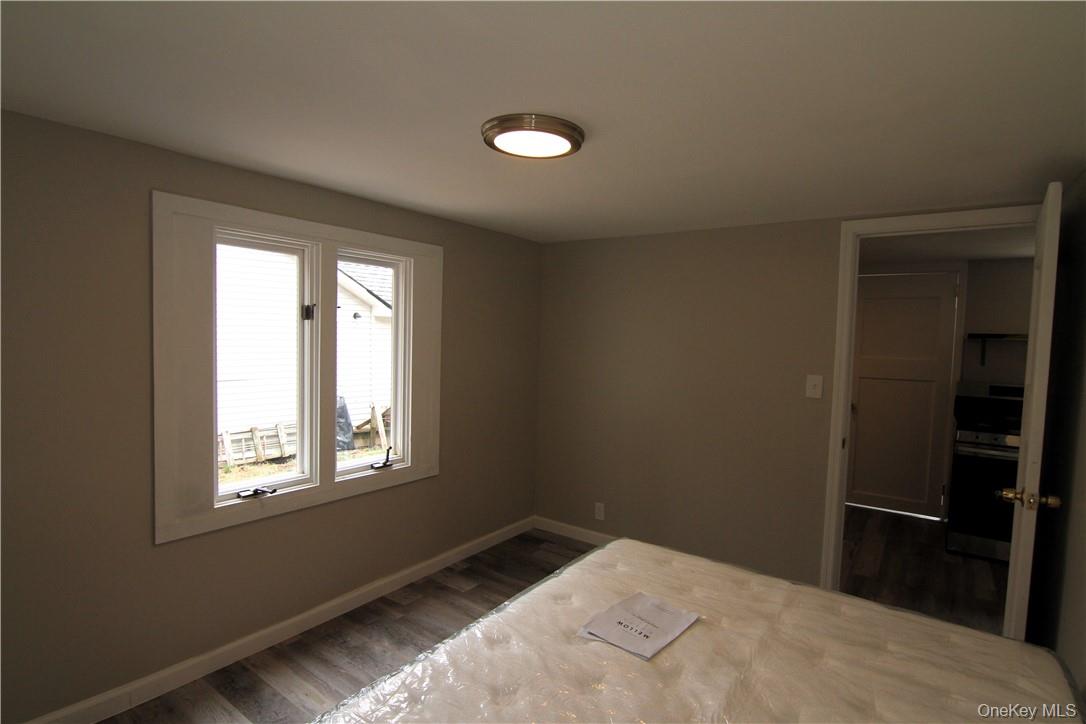 71 Miller Road, Unit 5 Hopewell Junction, NY 12533 - Photo 10 of 20 a bedroom with a bed and a window