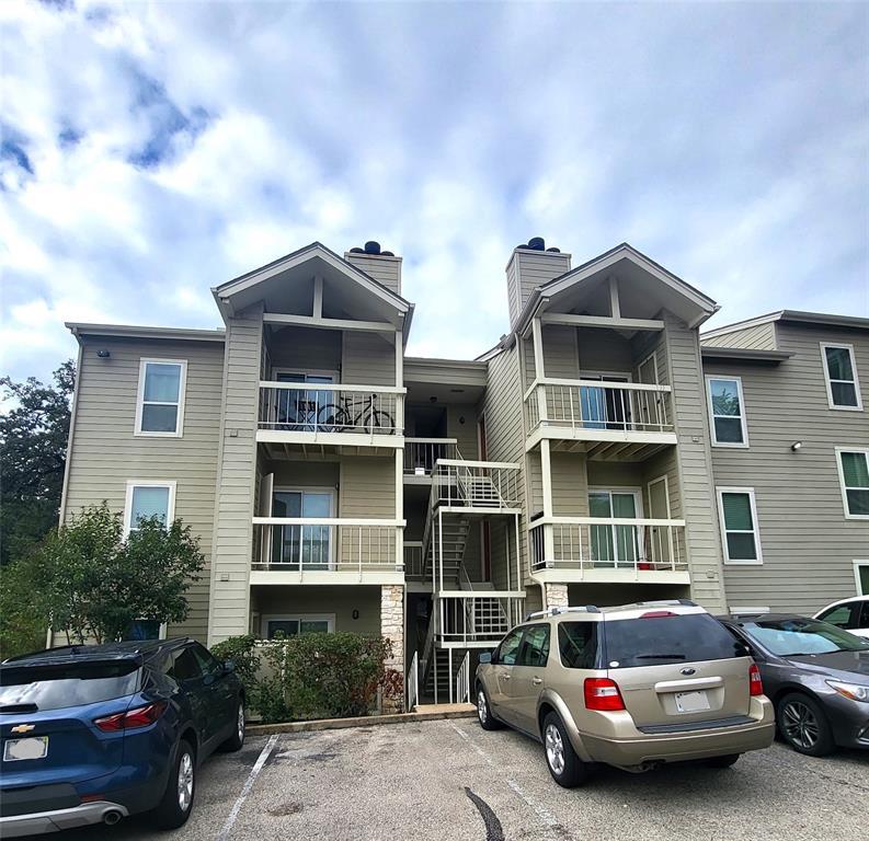 114 East 31st Street, Unit 201 Austin, TX 78705 - Photo 11 of 11 a car parked in front of a house