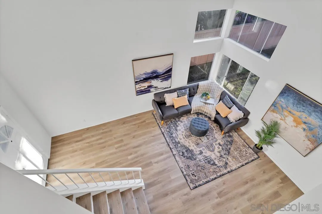 1518 Corte Roberto Oceanside, CA 92056 - Photo 16 of 41 a living room with furniture and a fireplace