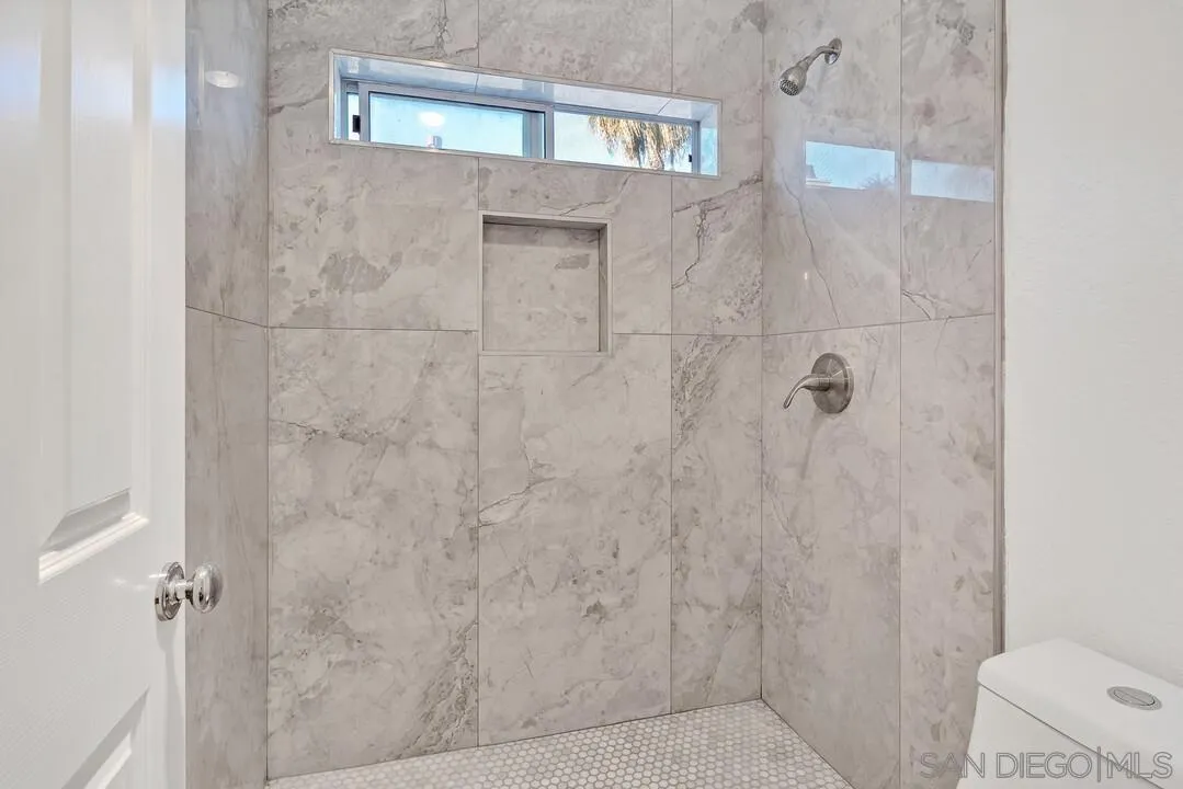 1518 Corte Roberto Oceanside, CA 92056 - Photo 29 of 41 a bathroom with a shower