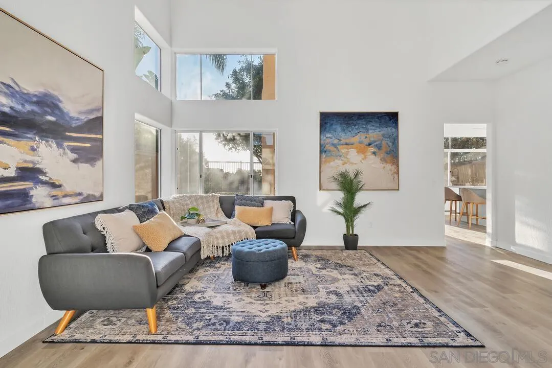 1518 Corte Roberto Oceanside, CA 92056 - Photo 4 of 41 a living room with furniture and a rug