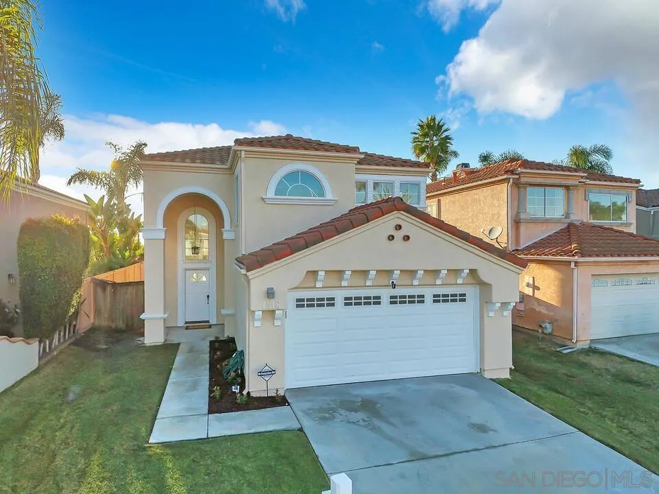 1518 Corte Roberto Oceanside, CA 92056 - Photo 41 of 41 a front view of a house with a yard