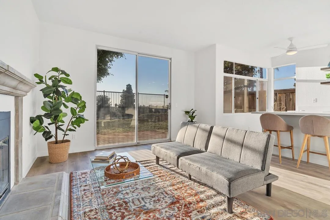 1518 Corte Roberto Oceanside, CA 92056 - Photo 5 of 41 a living room with furniture and a potted plant