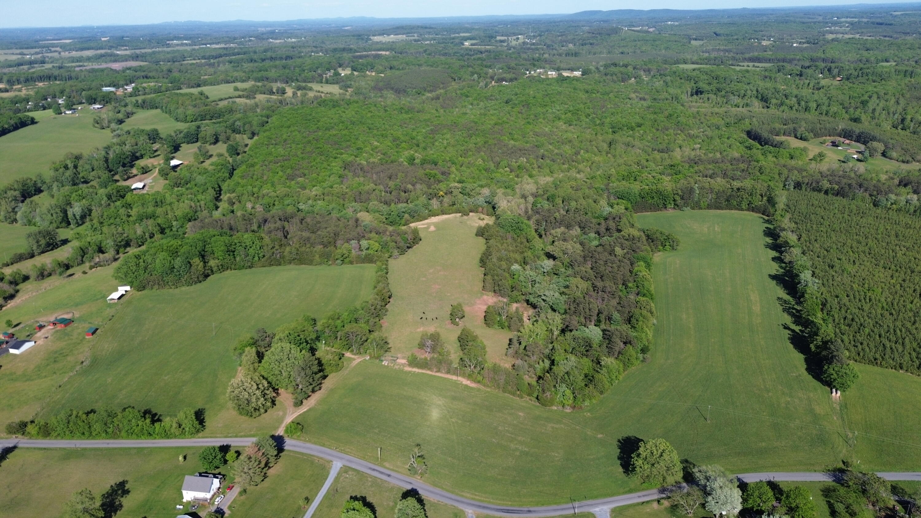 2556 Rock Cliff Road Bedford, VA 24523 - Photo 3 of 35 an aerial view of a residential houses with outdoor space and trees