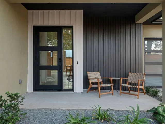a view of front door with outdoor seating