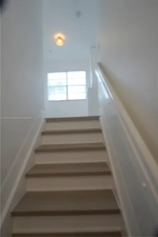 a view of cabinets and window