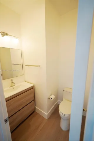 an empty room with windows and entrance