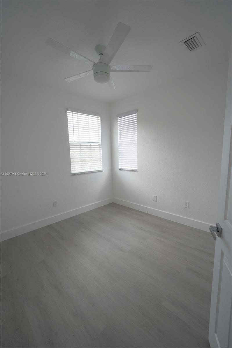 123 Harbors Way Boynton Beach, FL 33435 - Photo 23 of 38 an empty room with a window