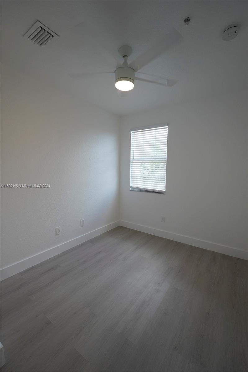 123 Harbors Way Boynton Beach, FL 33435 - Photo 25 of 38 an empty room with a window