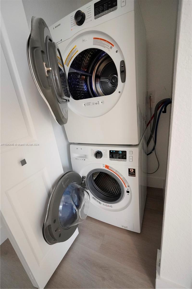 123 Harbors Way Boynton Beach, FL 33435 - Photo 27 of 38 a utility room with dryer and washer