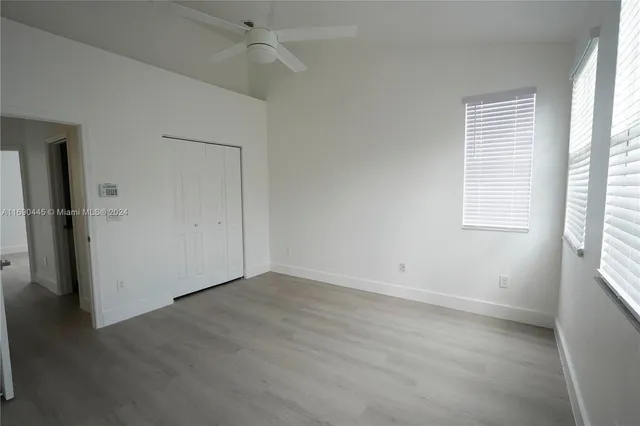 a view of a room with a sink and a cabinet