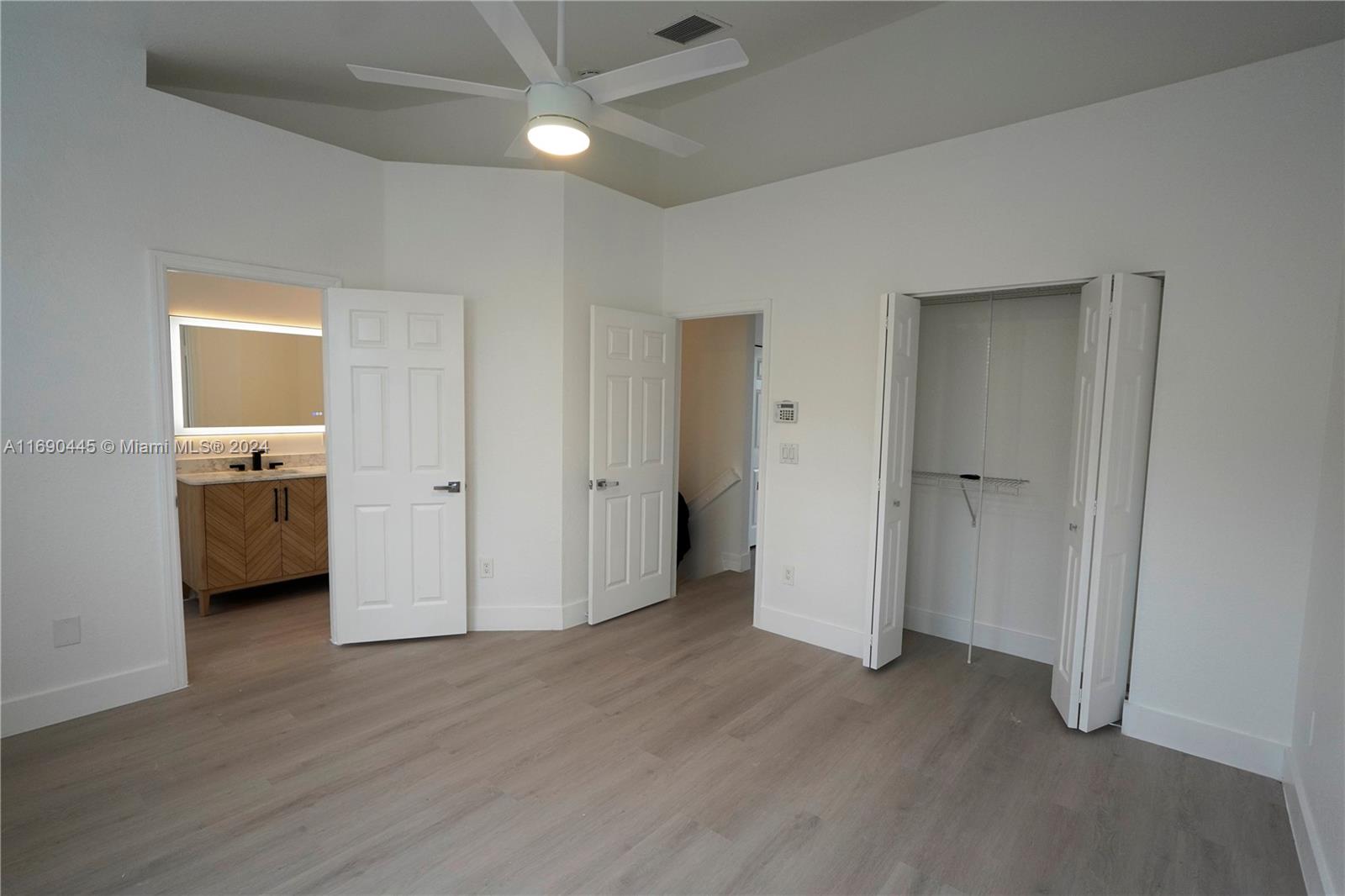 123 Harbors Way Boynton Beach, FL 33435 - Photo 30 of 38 a view of a room with a sink and a cabinet