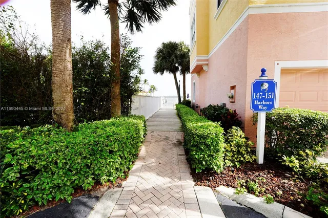 a view of a balcony with chairs