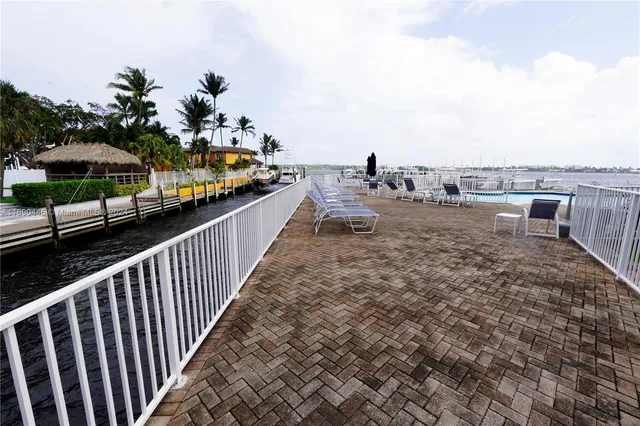a view of a street with a tree