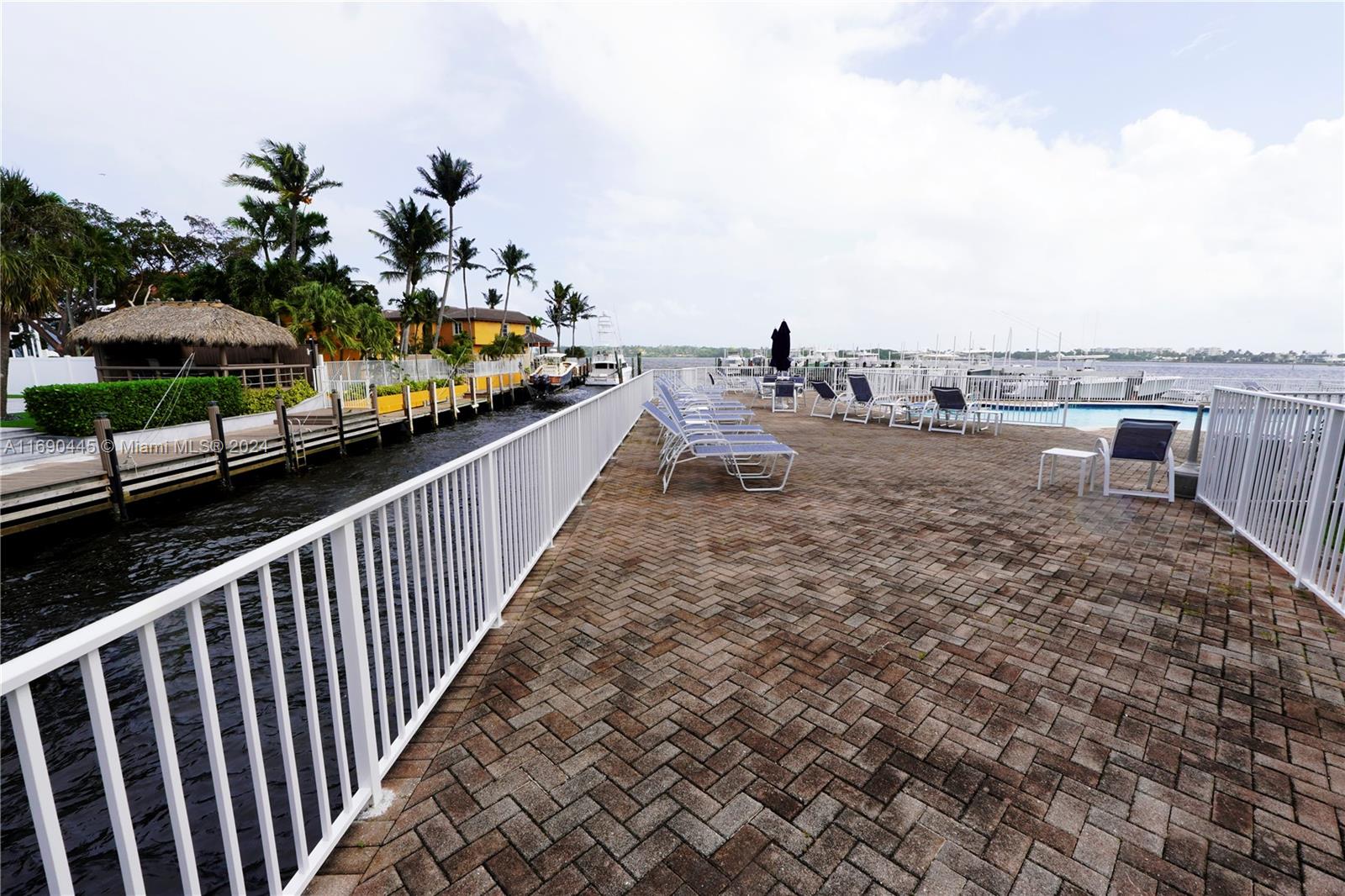 123 Harbors Way Boynton Beach, FL 33435 - Photo 35 of 38 a view of a balcony with chairs