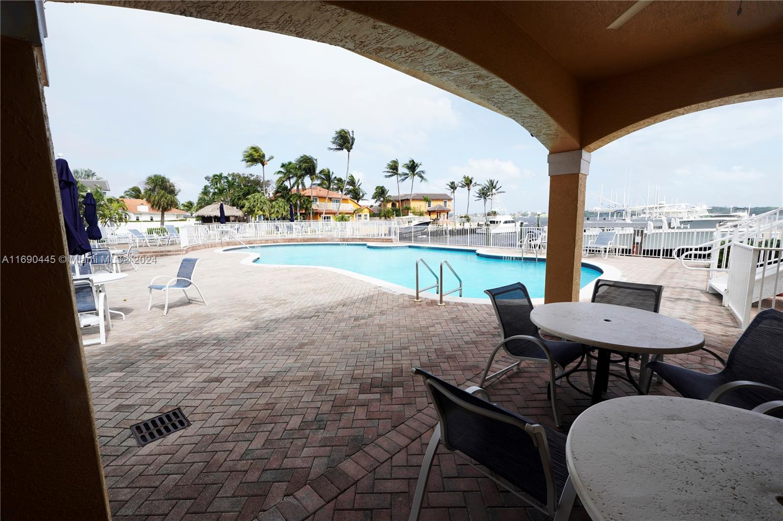 123 Harbors Way Boynton Beach, FL 33435 - Photo 38 of 38 a view of a balcony with table and chairs
