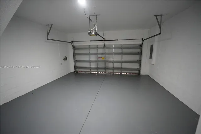 a view of hallway with furniture