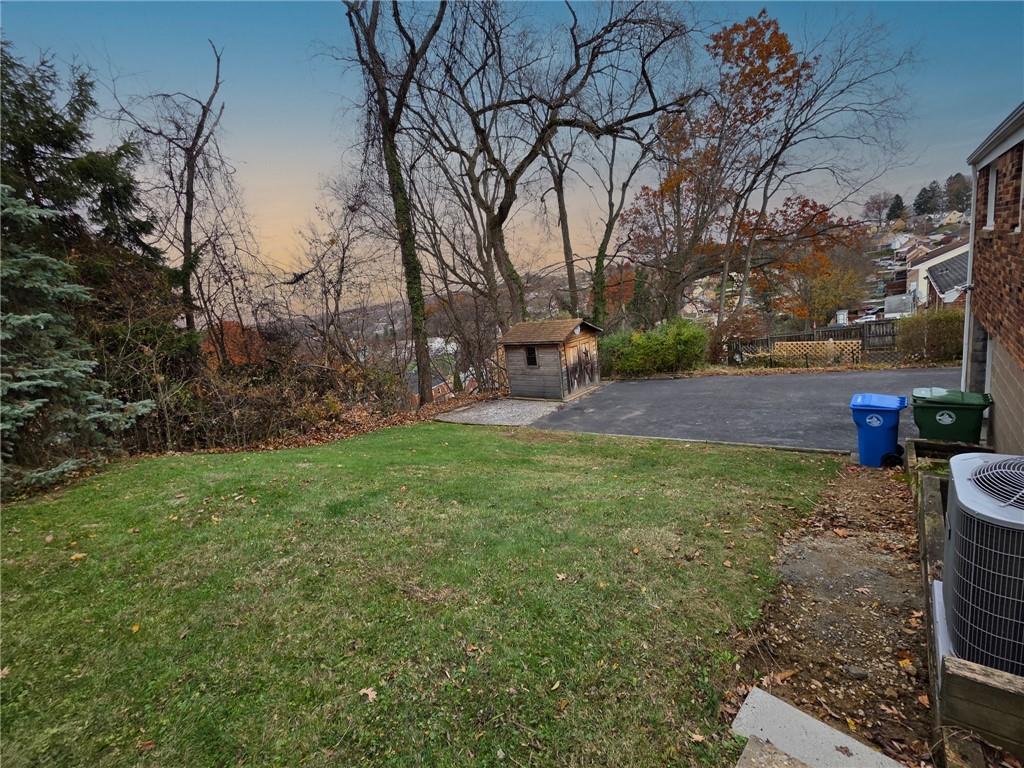 1494 Blossom Hill Road Pittsburgh, PA 15234 - Photo 35 of 40 a view of backyard with green space