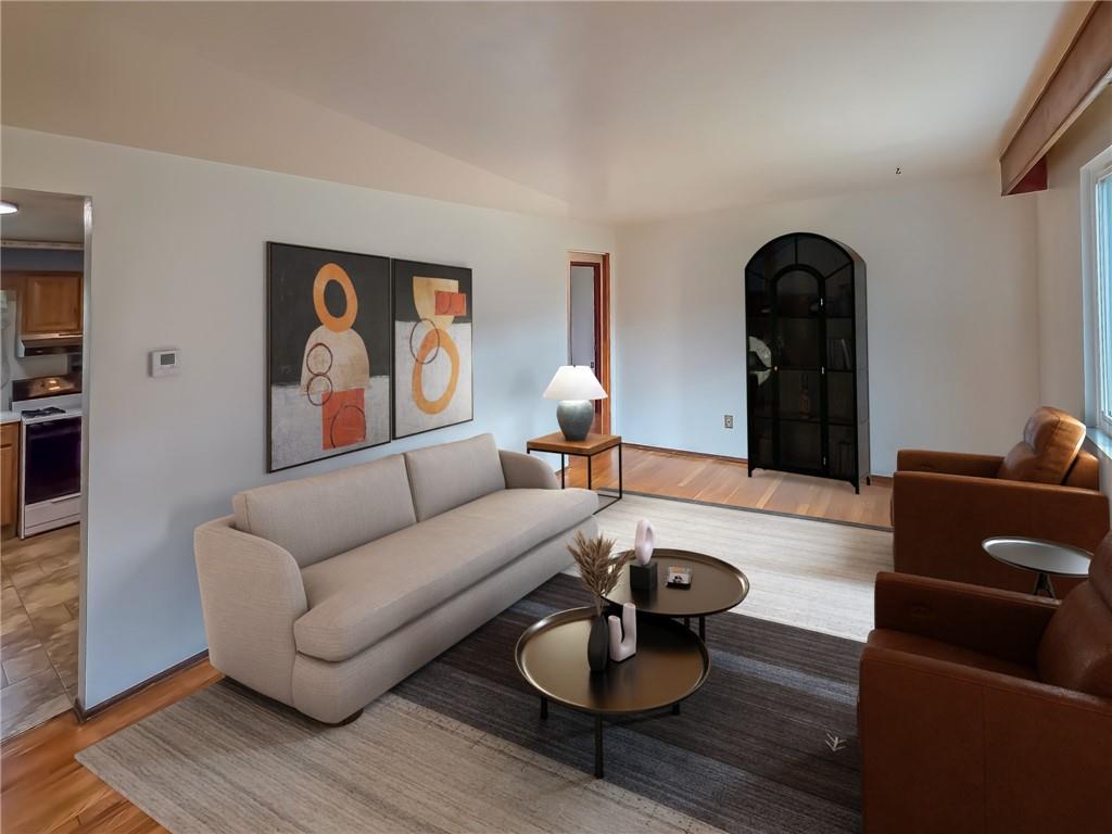 1494 Blossom Hill Road Pittsburgh, PA 15234 - Photo 7 of 40 a living room with furniture and wooden floor