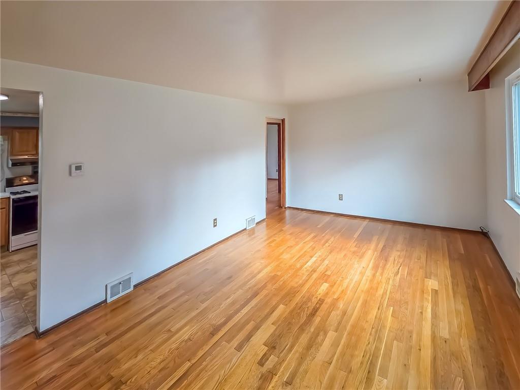 1494 Blossom Hill Road Pittsburgh, PA 15234 - Photo 8 of 40 a view of room with wooden floor