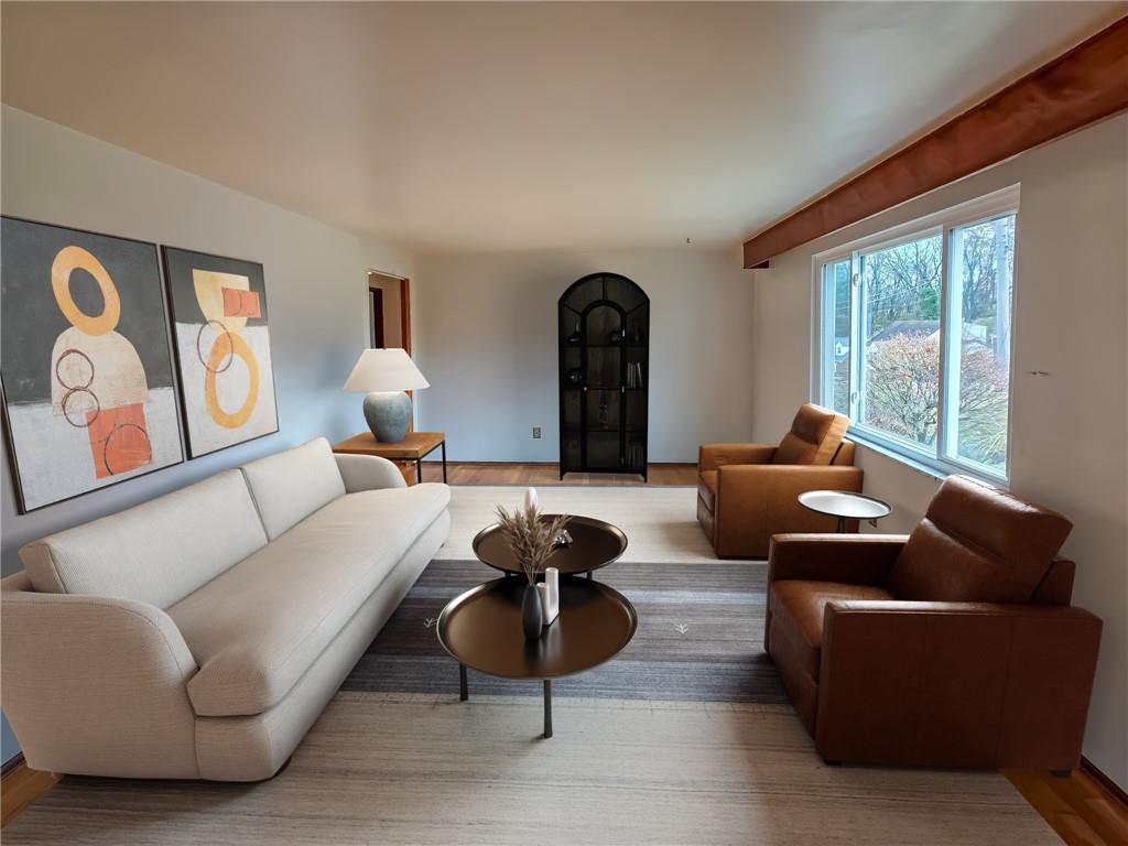 1494 Blossom Hill Road Pittsburgh, PA 15234 - Photo 9 of 40 a living room with furniture and a large window