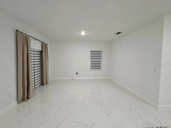 a view of empty room with window