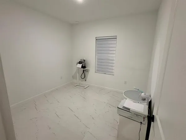 a view of small space with racks on the wall