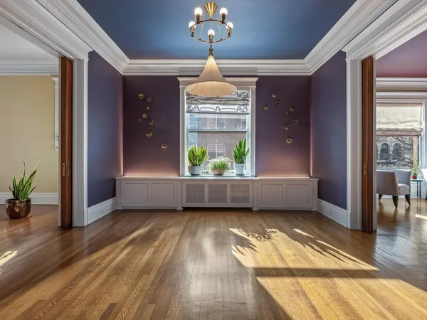 a view of entryway with wooden floor