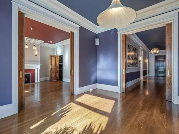 a view of livingroom with hardwood floor and a ceiling fan