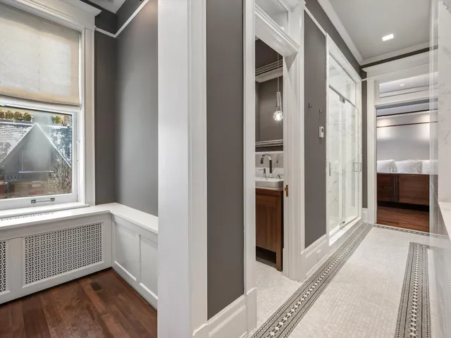 a kitchen with kitchen island a sink appliances and cabinets
