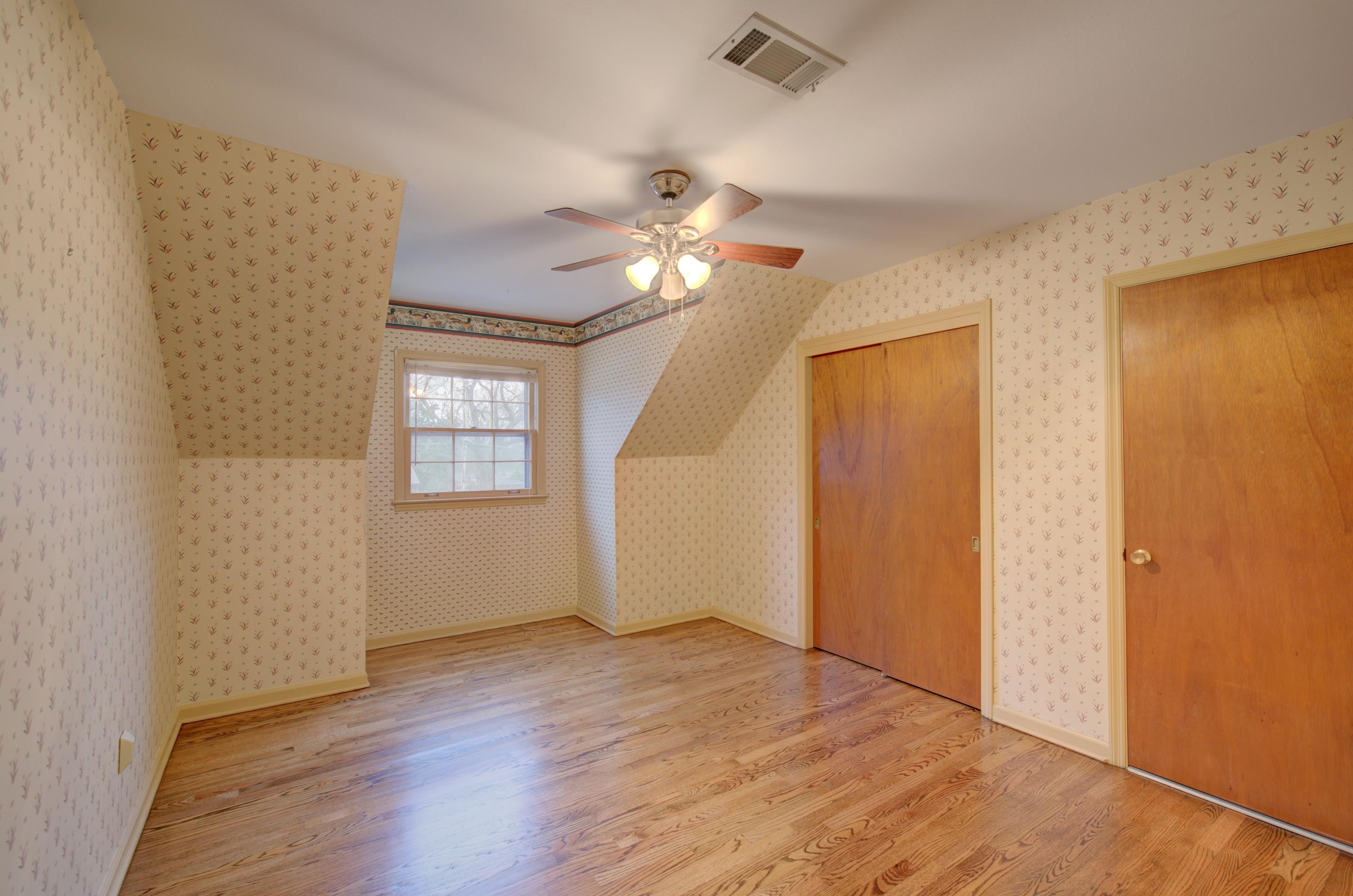 5545 Rich Road Memphis, TN 38120 - Photo 17 of 20 wooden floor in an empty room with a window