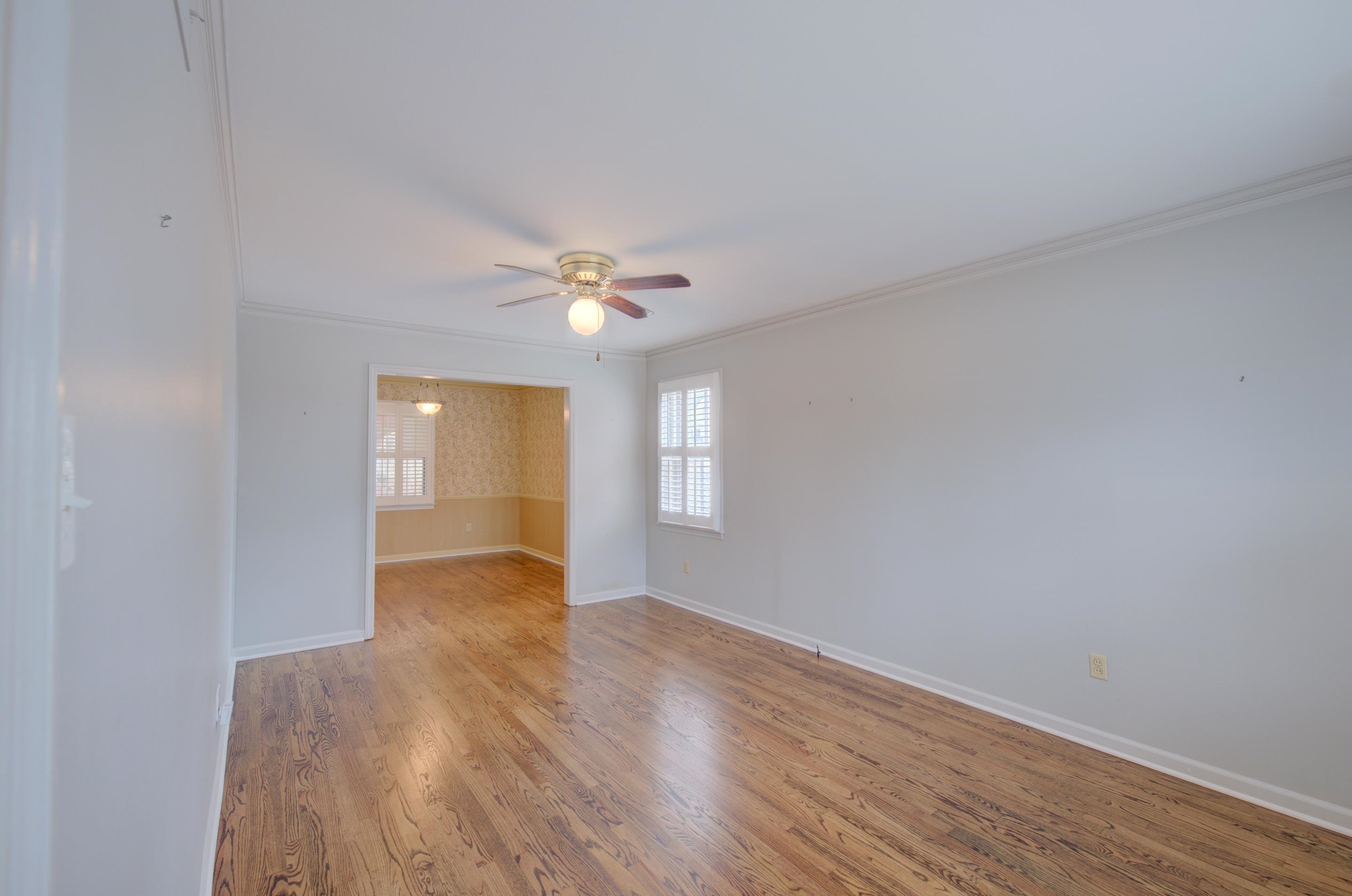 5545 Rich Road Memphis, TN 38120 - Photo 5 of 20 a view of an empty room with wooden floor