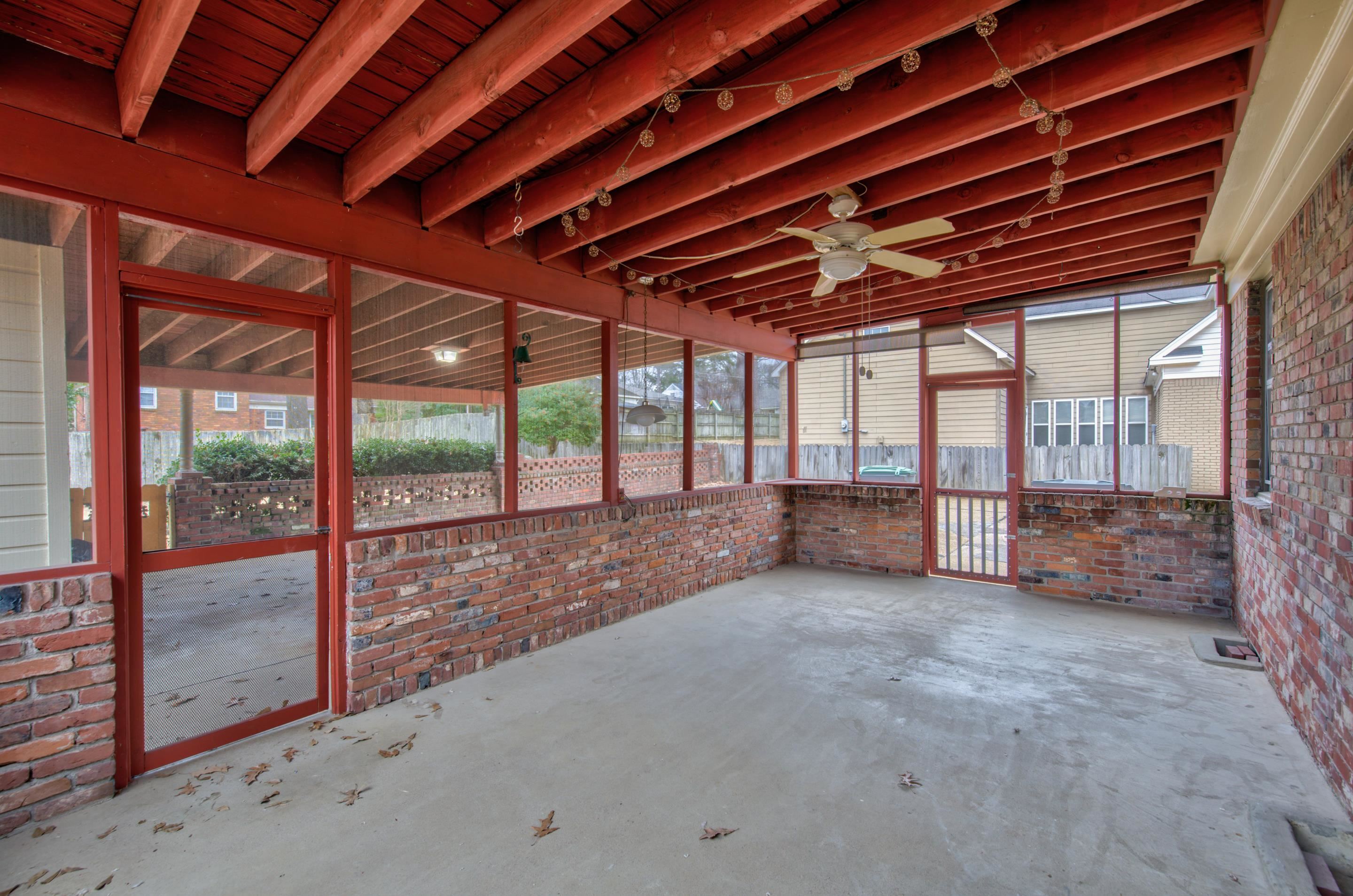 5545 Rich Road Memphis, TN 38120 - Photo 6 of 20 a view of an empty room with a balcony
