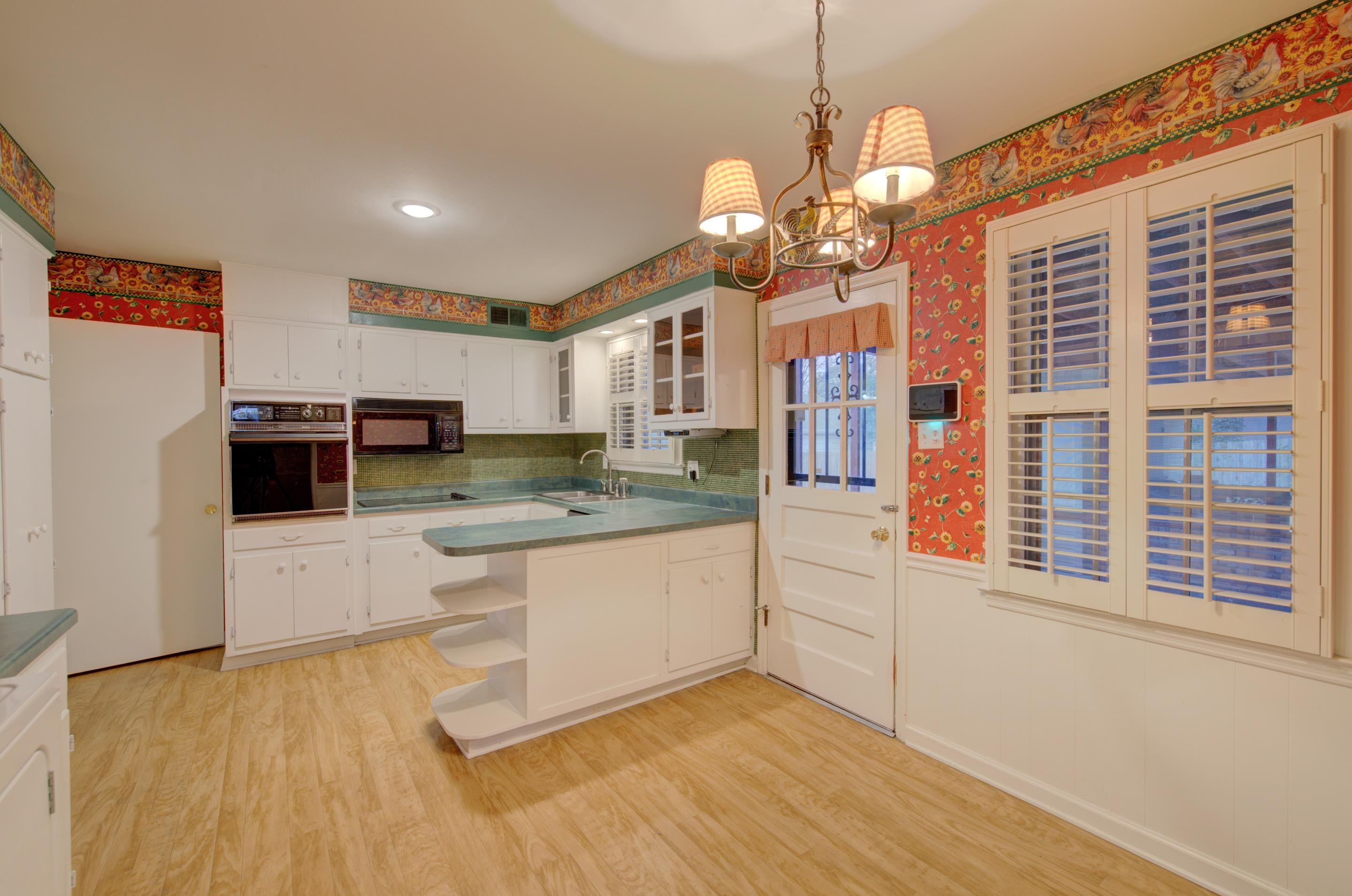5545 Rich Road Memphis, TN 38120 - Photo 8 of 20 a open kitchen with stainless steel appliances granite countertop a stove and cabinets