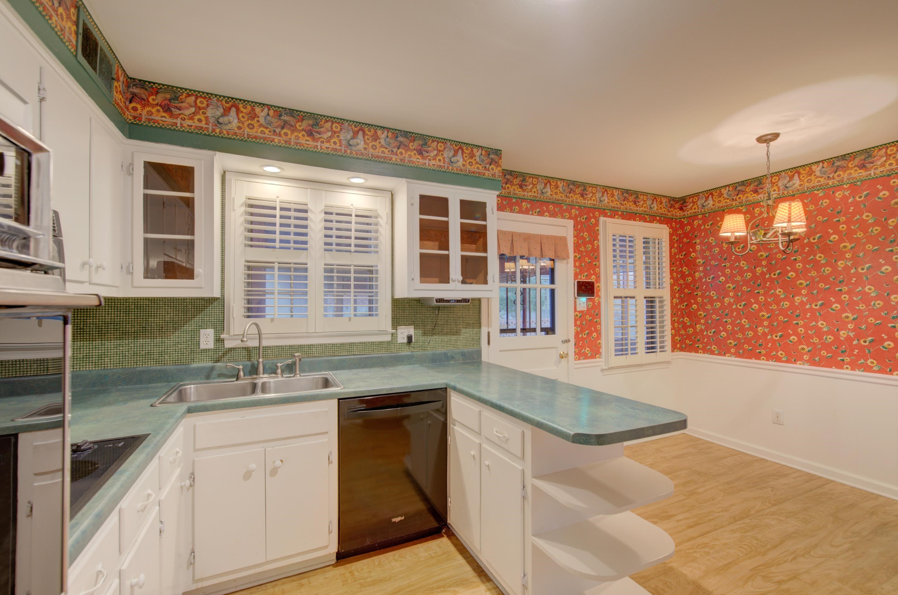 5545 Rich Road Memphis, TN 38120 - Photo 10 of 20 a kitchen with granite countertop a sink stove and cabinets