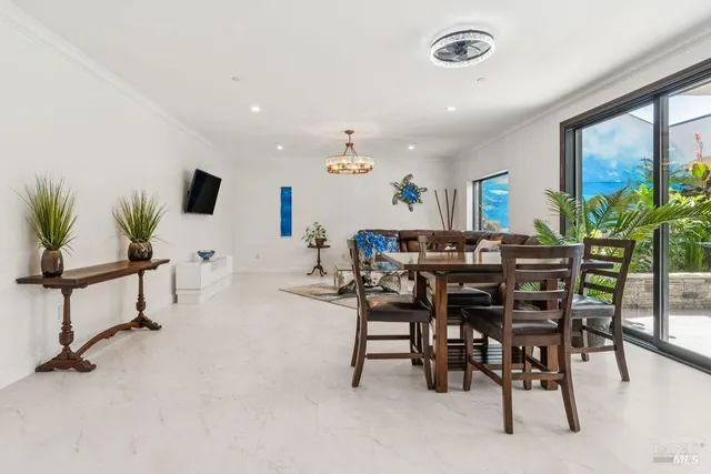 an aerial view of a house with a garden