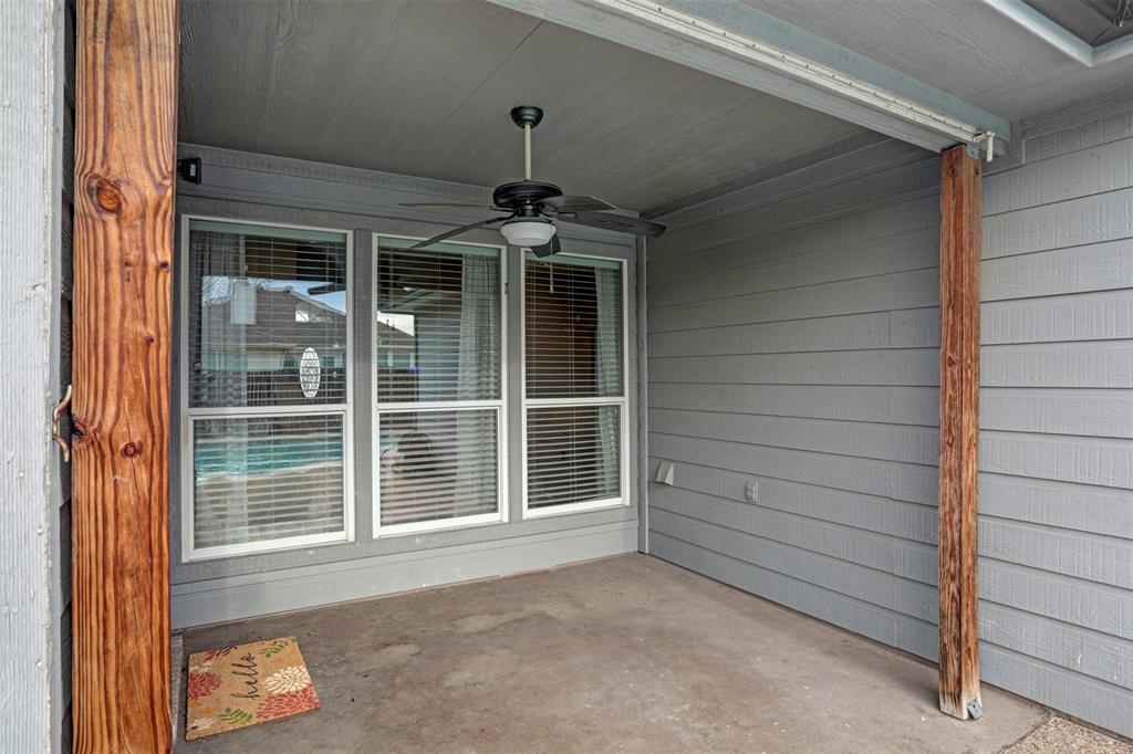 1005 Caleb Street Burleson, TX 76028 - Photo 23 of 31 a view of door and chair in the balcony