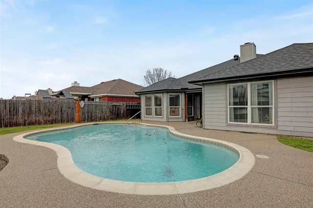 a view of a backyard of a house