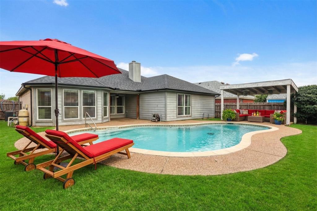 1005 Caleb Street Burleson, TX 76028 - Photo 28 of 31 a view of pool with a backyard