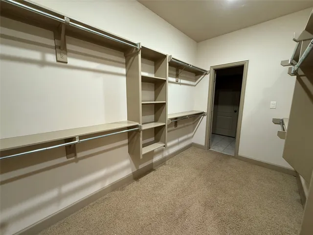 a room with walk in closet