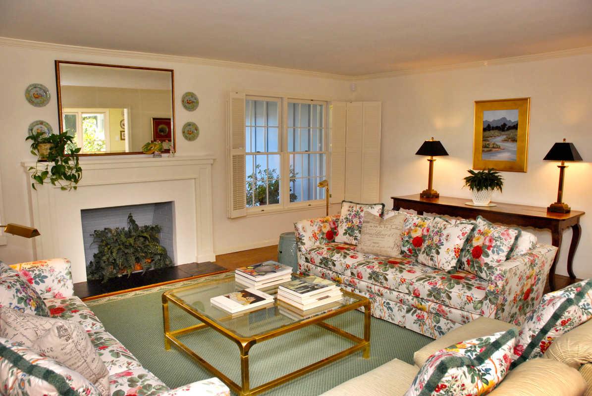167 Toyon Road Atherton, CA 94027 - Photo 5 of 25 a living room with furniture and a fireplace