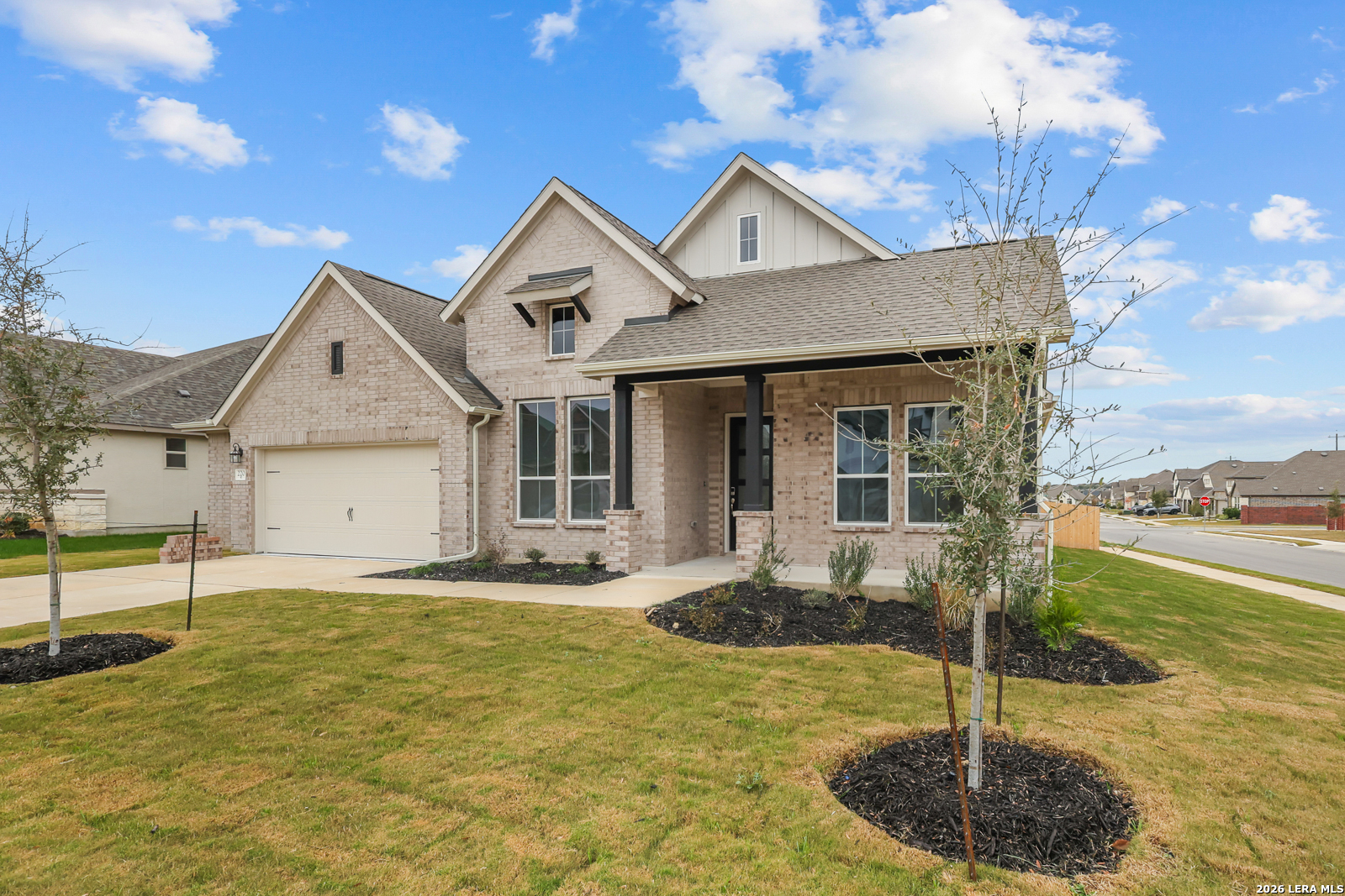 220 Fillmore Falls Cibolo, TX 78108 - Photo 2 of 30 a front view of a house with a yard