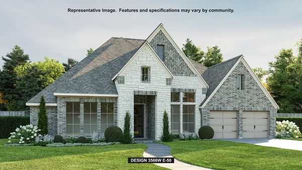 a front view of a house with a garden and plants