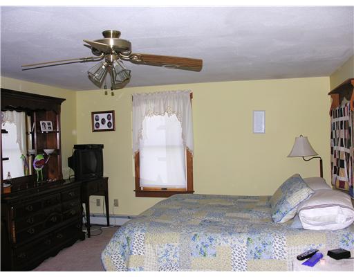 148 East Killingly Road Foster, RI 02825 - Photo 5 of 10 Master Bedroom. Master bedroom with ceiling fan and cubbies built in for extra storage.