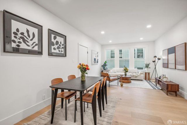 a dining room with furniture and a livingroom